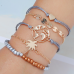 Set Armbanden - Witte Armband Wereldbol Hartje Palmboom Goudkleurige Armband - 5 delig